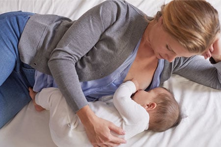 breastfeeding positions to help baby latch banner