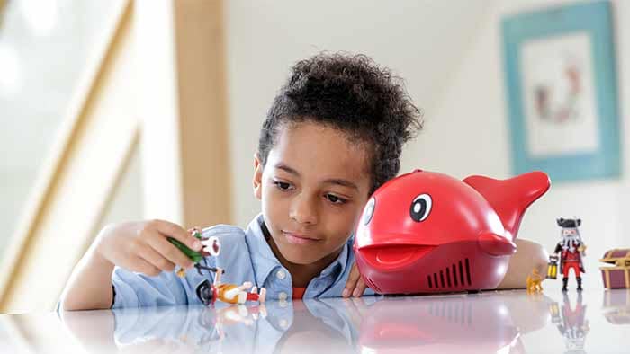 kid with nebulizer