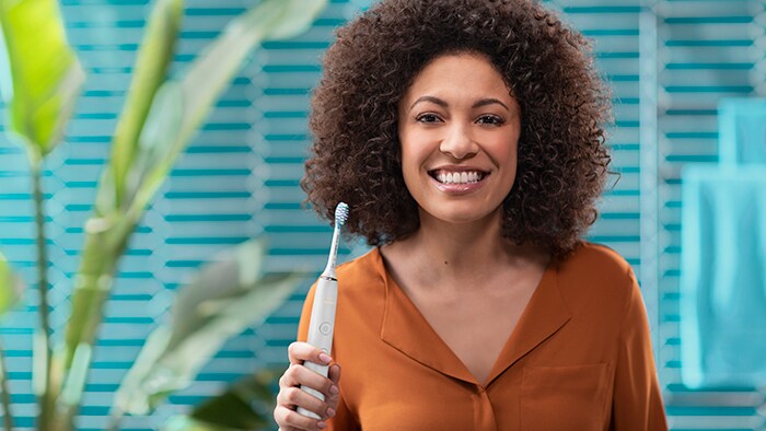 Smiling with toothbrush